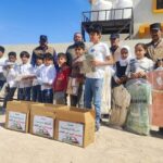 الشرطة المجتمعية توزع كسوة العيد لعدد من تلاميذ مدرسة التضامن الثامنة للايتام في قضاء الاصلاح